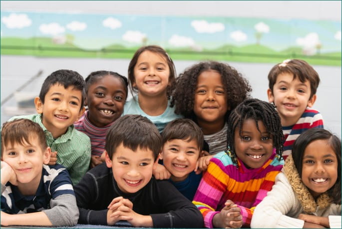 group of children smiling into camera