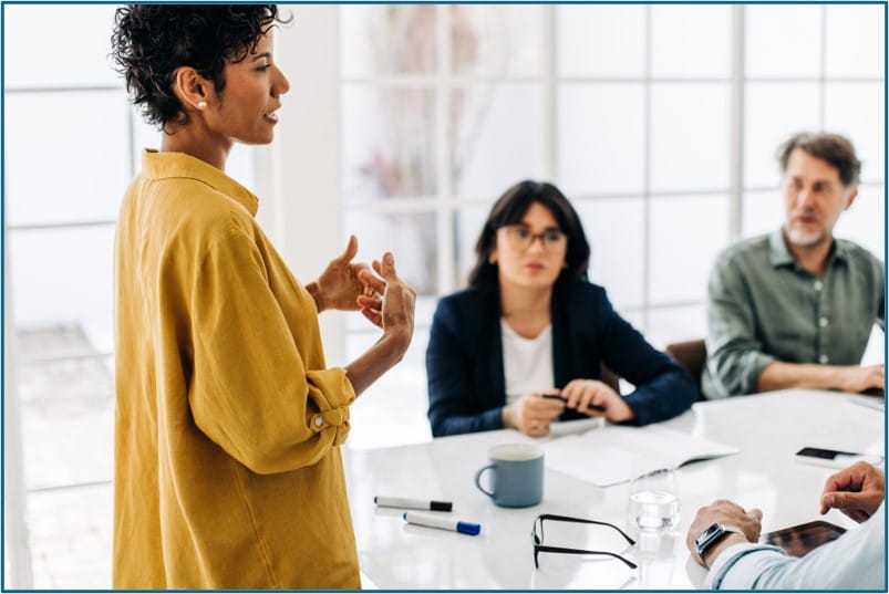 Woman talking at a meeting
