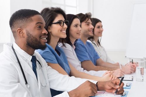 Health care providers watching a presentation