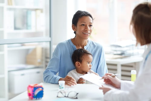 Mother and child at doctors office