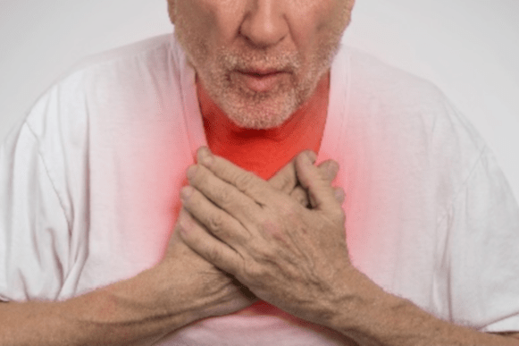 COPD man holding chest