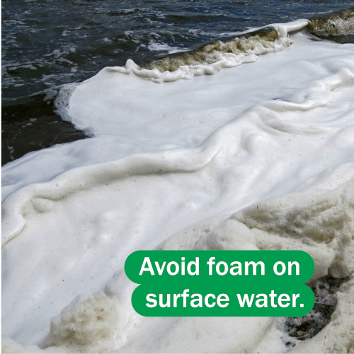 Foam on water and text reading 