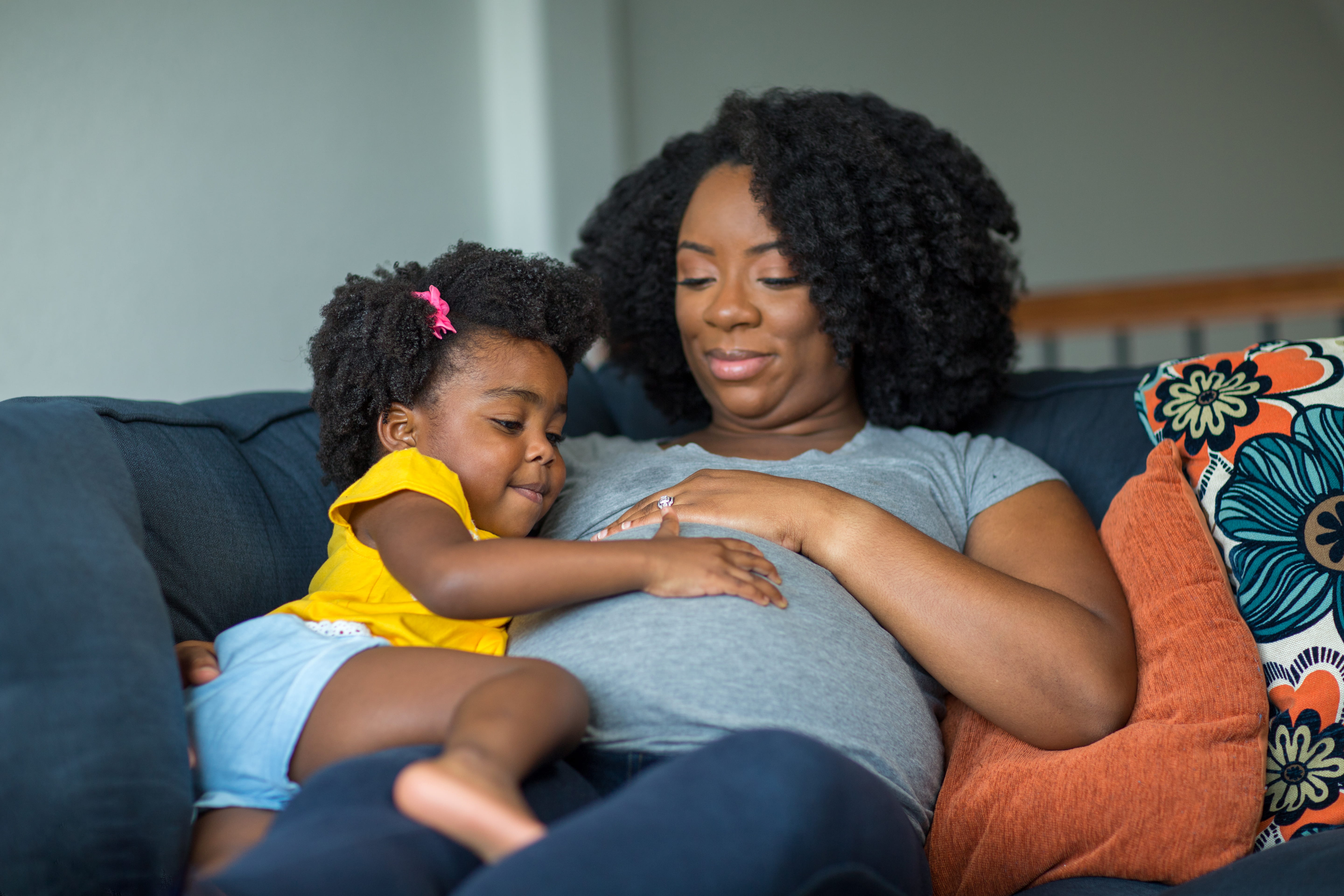 Pregnant mother with child