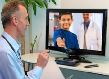 child and doctor on video