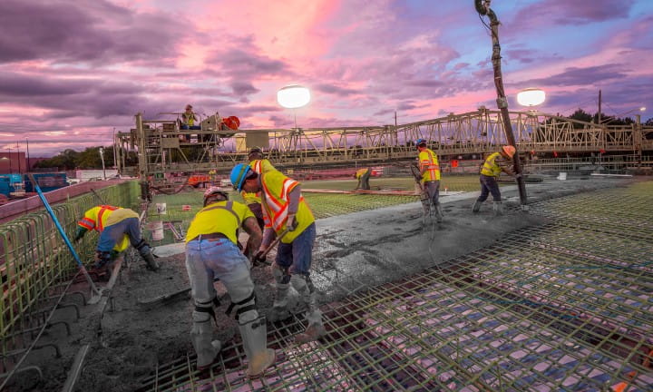 Concrete deck pour on the Chene Street bridge over I-94.
