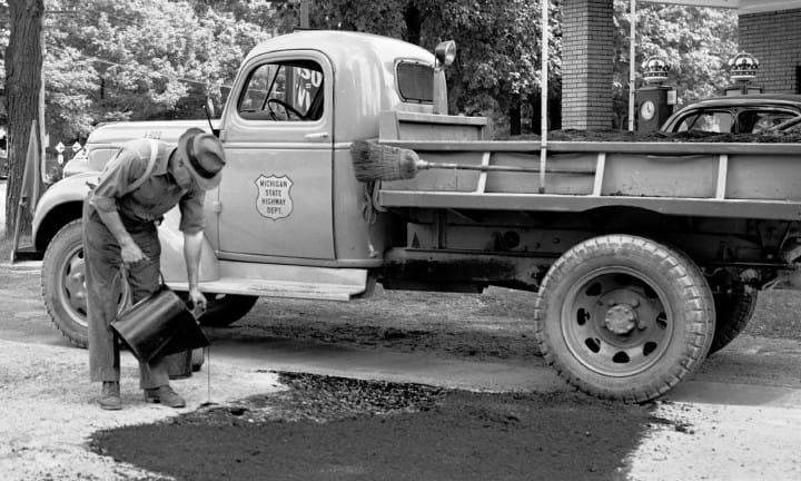 Michigan State Highway Department road maintenance equipment.