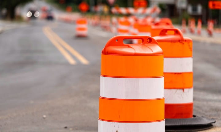 Barrels and barricades set up on 100th Street near US-131 in Kent County.