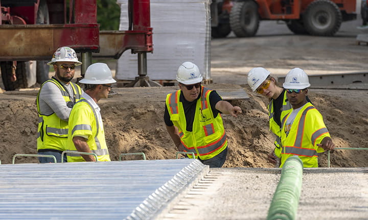 Group of workers discussing business
