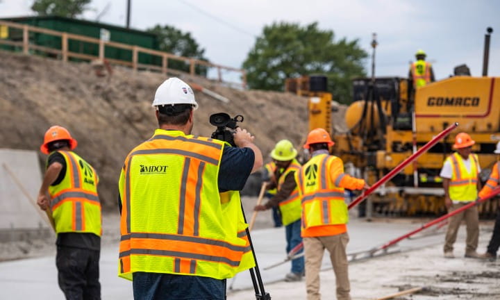 MDOT videographer takes video of workers on the I-75 Modernization project in Detroit.