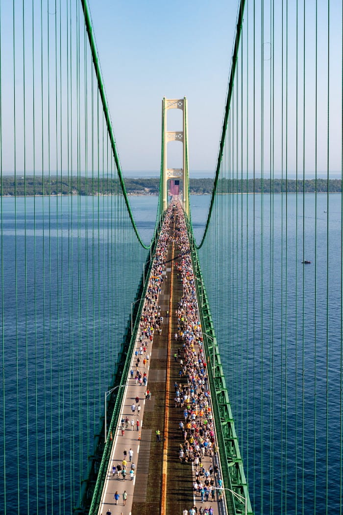 A view looking down on the 35,000 walkers who crossed the Mackinac Bridge in 2023.