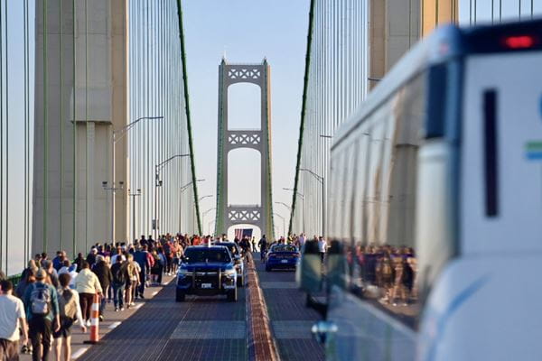 People walk in each direction past the south tower during the 2024 Mackinac Bridge Walk.