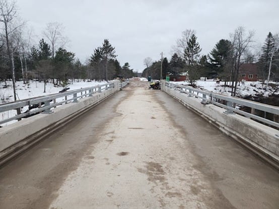 The Reynolds Road bridge over the Betsie River was reopened to traffic Dec. 17 as part of the Michigan Department of Transportation (MDOT) local agency bridge bundling program.  (Photo by OHM Advisors)