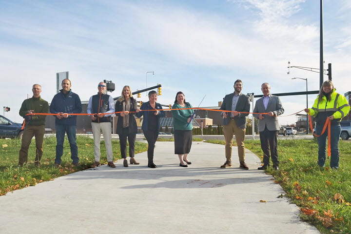 State and local officials celebrated early completion of the US-31 rebuilding project with a ribbon cutting today at the newly rebuilt Grandview Parkway/Front Street intersection.