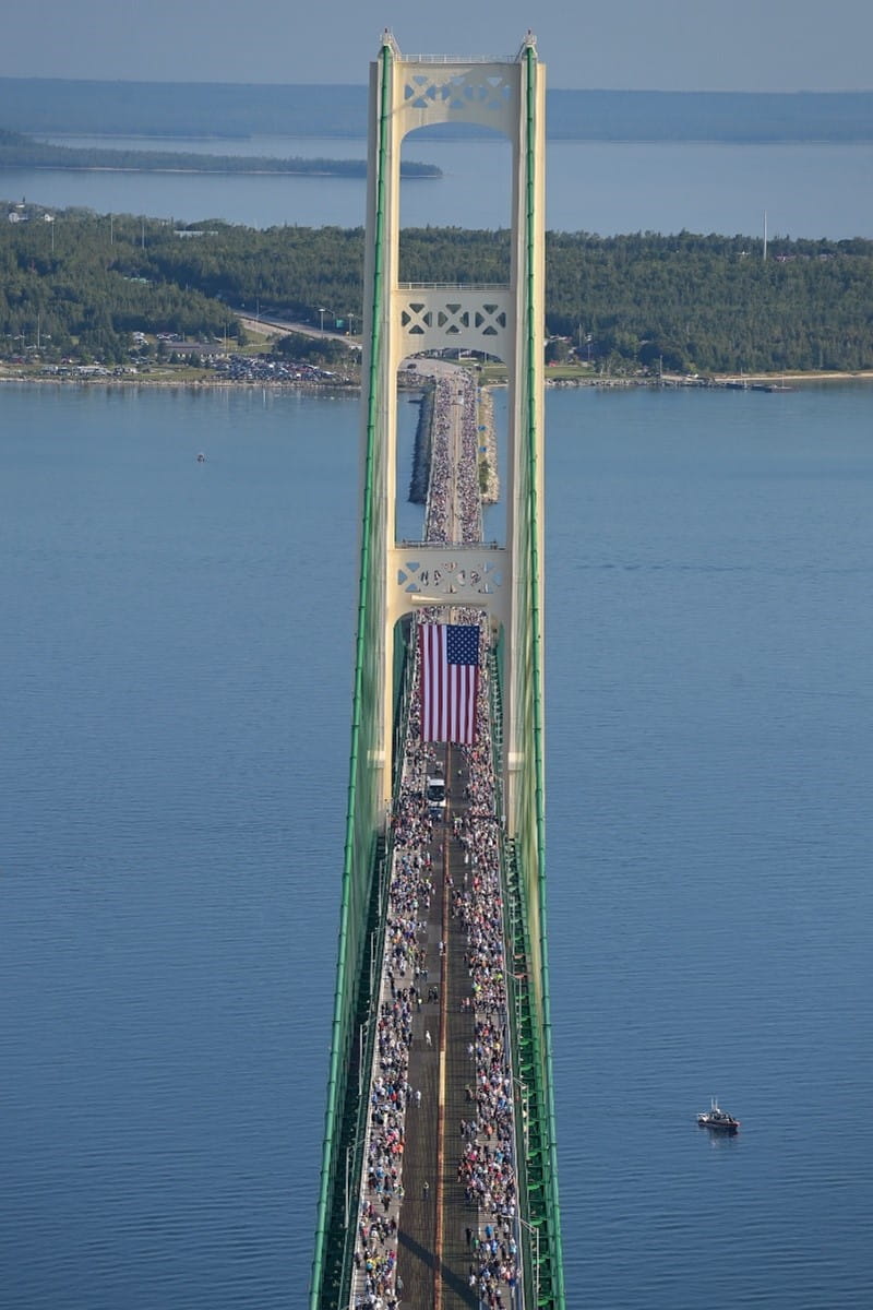 A view from the south tour looking at the north tour of participants walking in each direction during the 2025 Mackinac Bridge Walk.