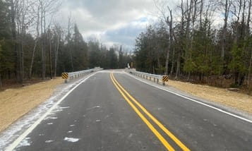 ¬The Shubert Highway bridge over Monaghan Creek in Presque Isle County reopened to traffic Monday, Nov. 10, as part of the Michigan Department of Transportation (MDOT) local agency bridge bundling program. (Photo by RS Scott & Associates)