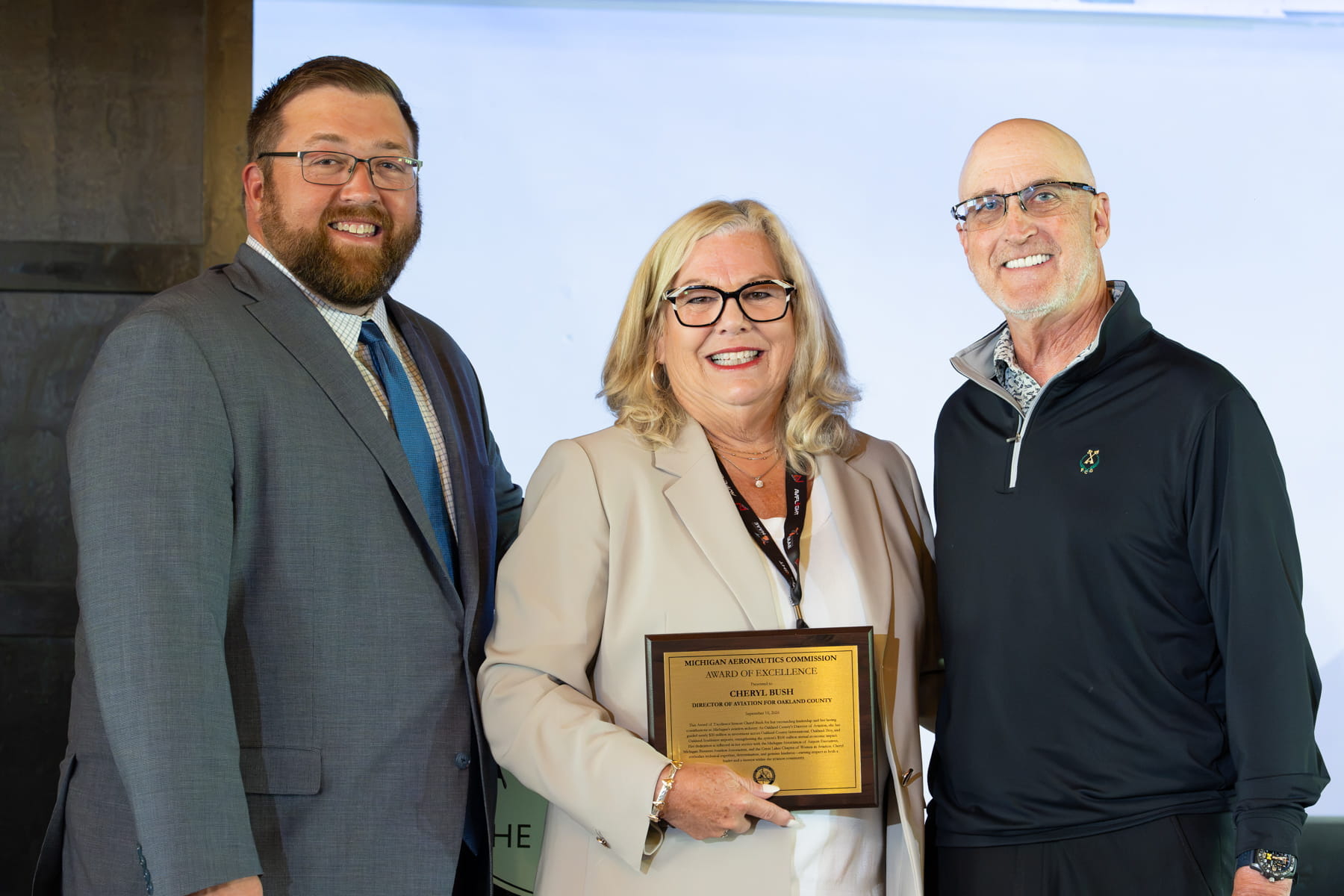 Left to right: Bryan Budds, MAC and MDOT Office of Aeronautics director; Cheryl Bush, director of aviation for Oakland County and Benjamin R. Carter, MAC chair.  