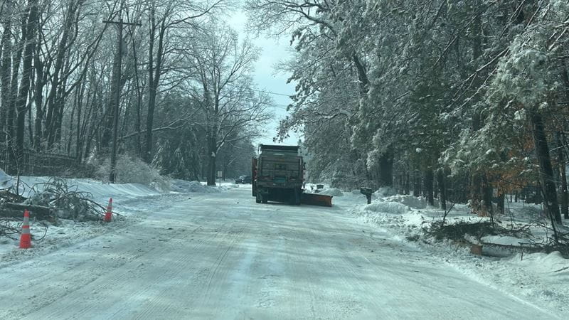 An MDOT plow helps clear a local road in Wexford County following the winter storm and freezing rain event.