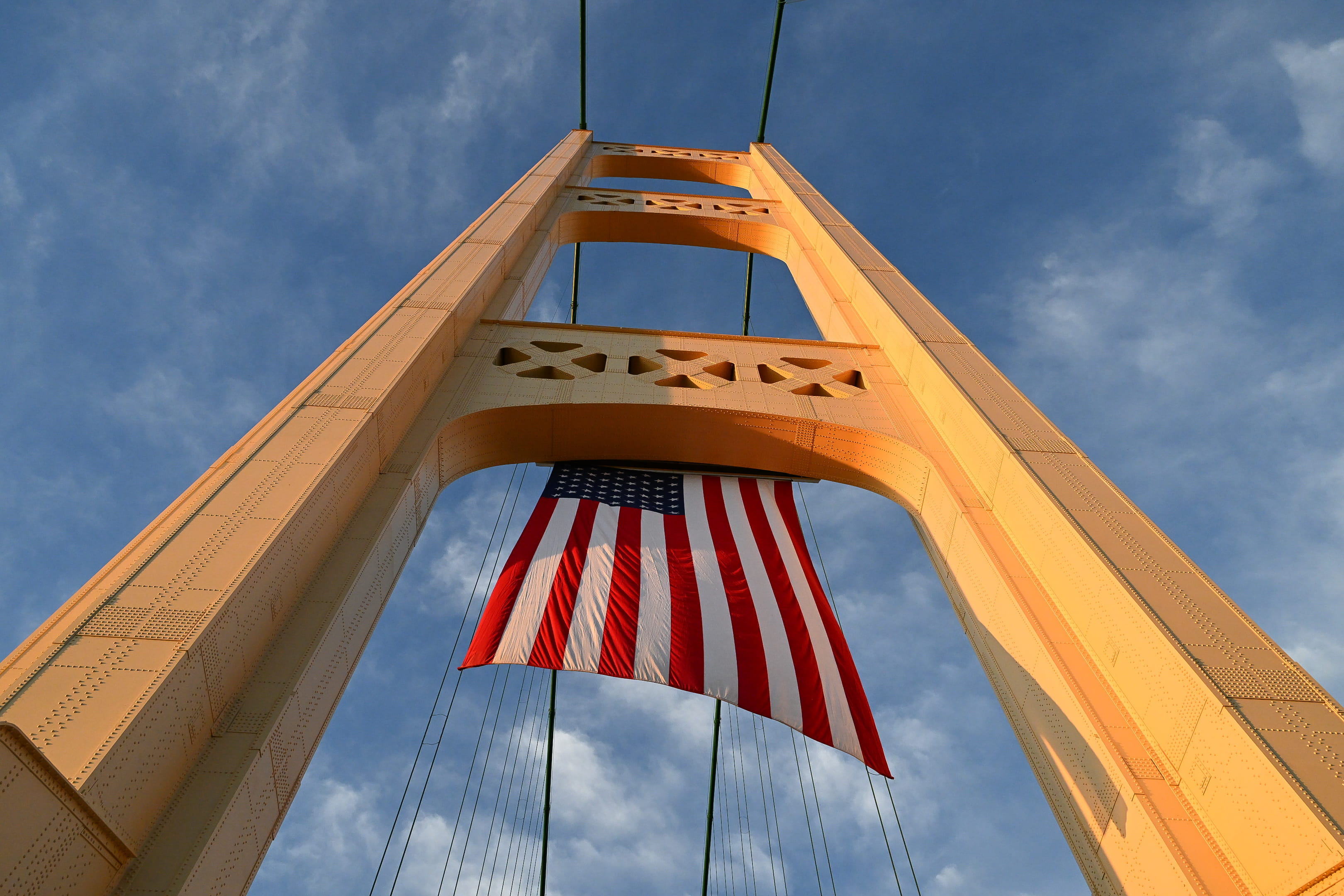 The American flag on display under the Mackinac Bridge north tower.