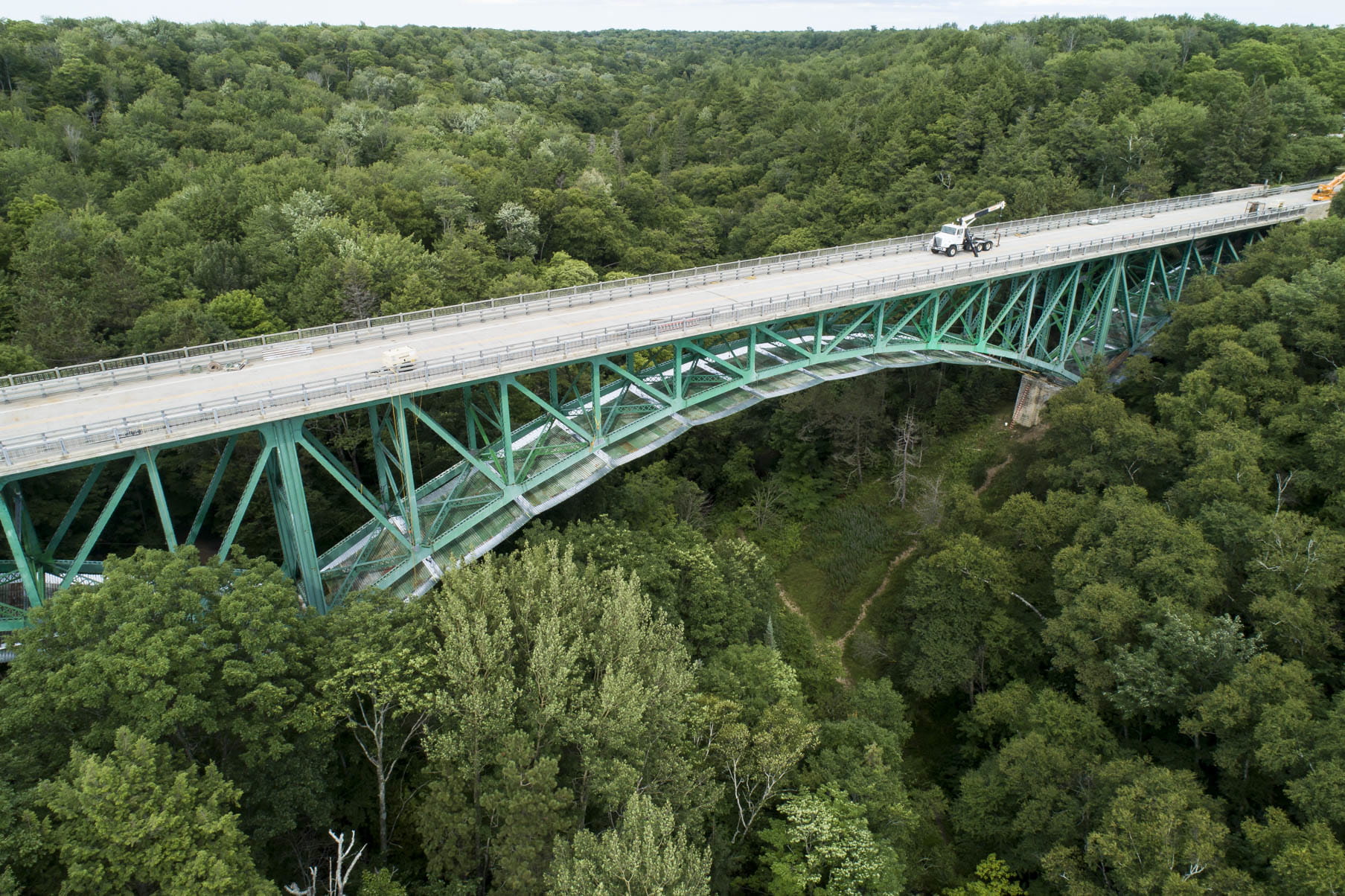 A drone captures painting and repairs on the Cut River Bridge.