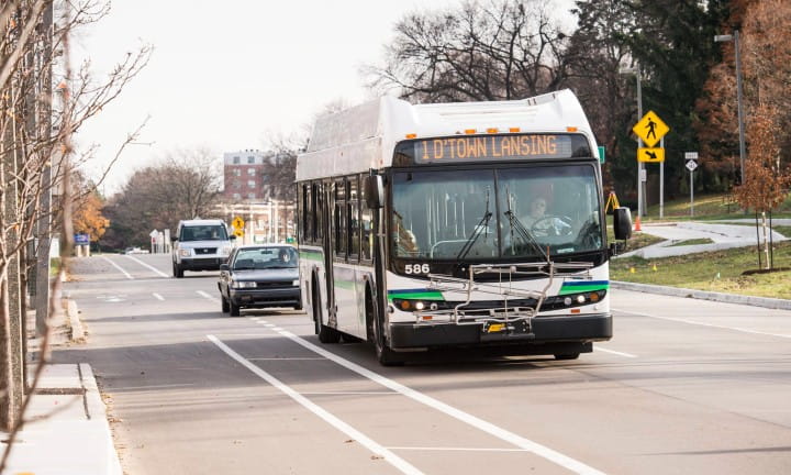 Reconstructed M-143 (Michigan Ave.) in East Lansing. The road includes a new and improved bike lane, sidewalks, crosswalks, retention island and landscaping.