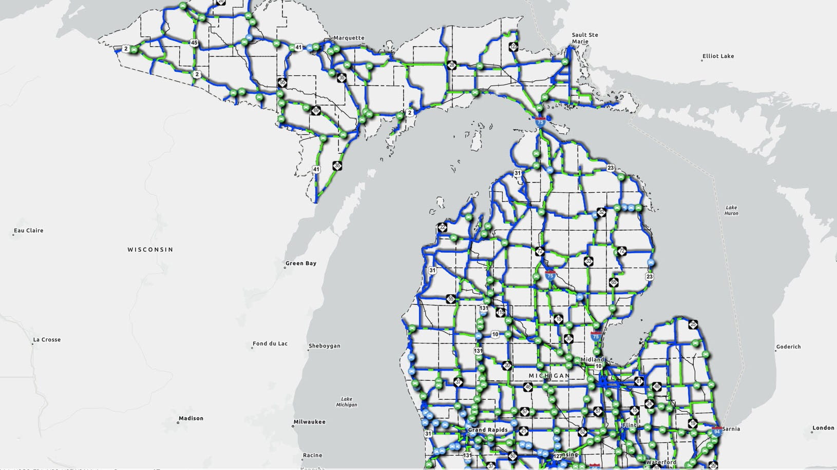 A screenshot of the Adopt-A-Highway location map showing the available (in green) and unavailable (in blue) sections of highways and carpool lots.