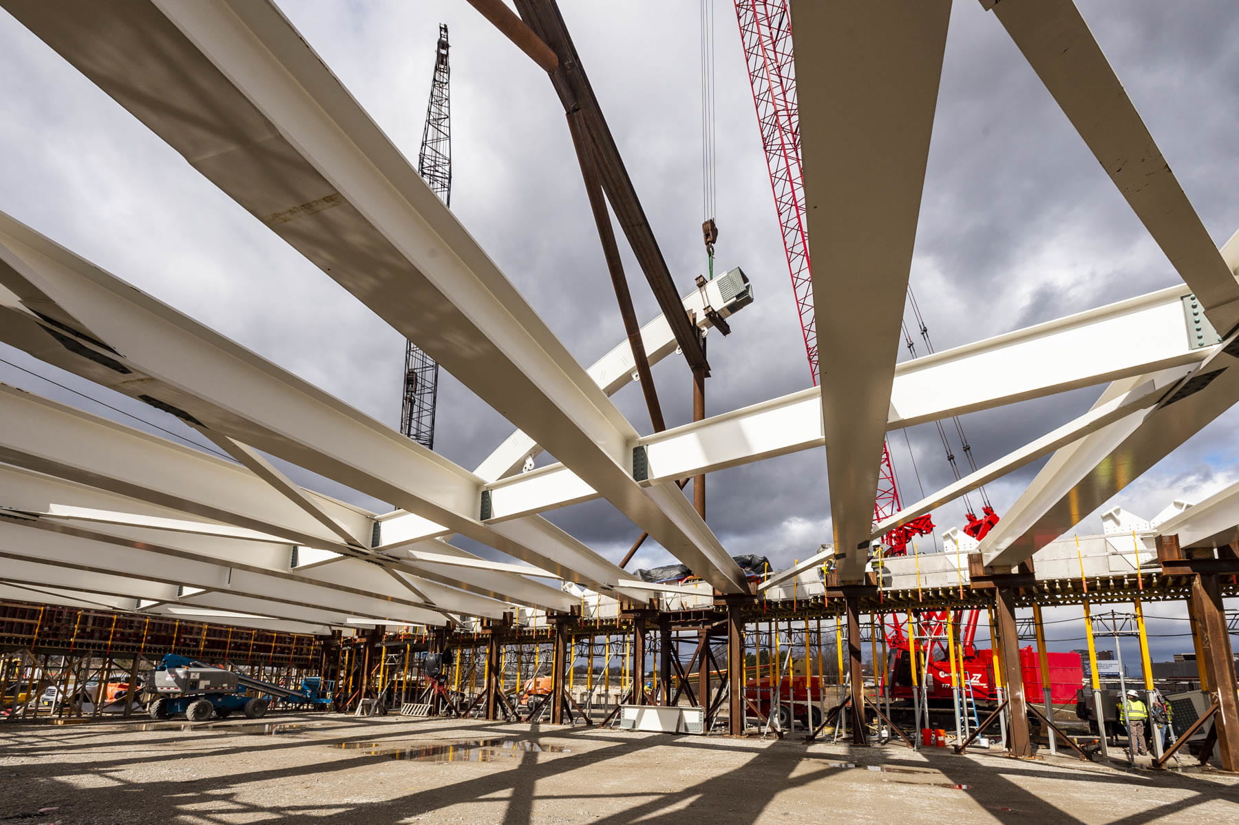 Underside of bridge showing the placement of beams, all parallel to each other.