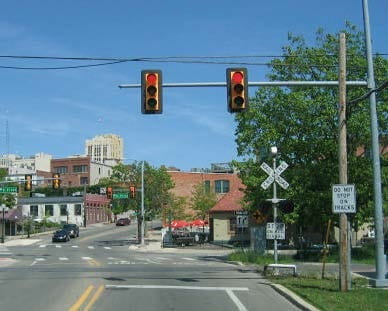 Traffic signals interconnected with railroad crossing warning signals