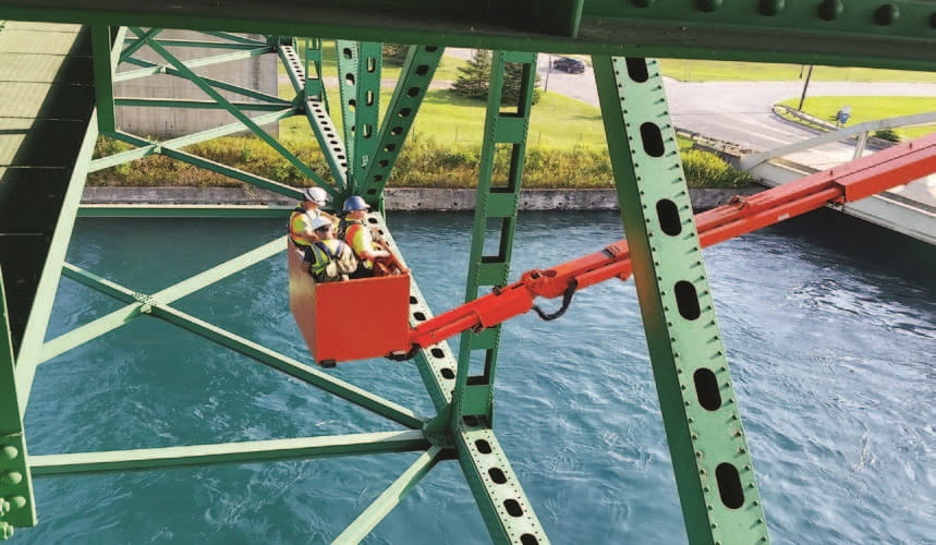 Underbridge inspection units (UBIUs) that reach from above deck to below.