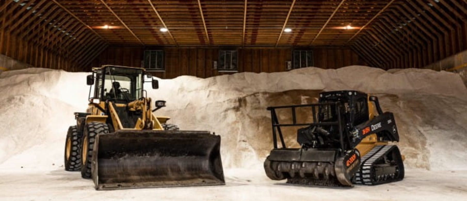 Two winter maintenance vehicles. 