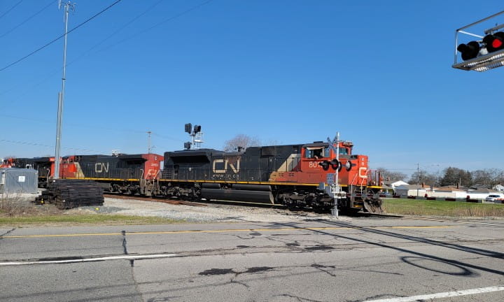 A Canadian National (CN) train crosses M-85.