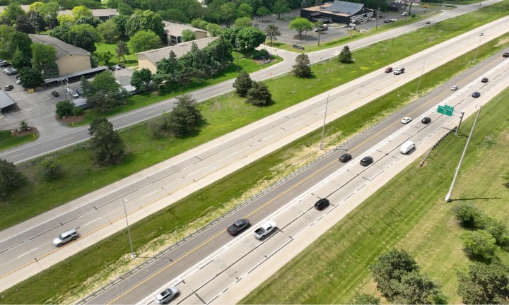 A drone shot of the I-94 CAV corridor pilot project lanes and poles.