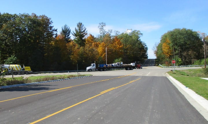 A photo showing semi trucks at the intersection of M-37 and 92nd Street in Caledonia, Michigan.
