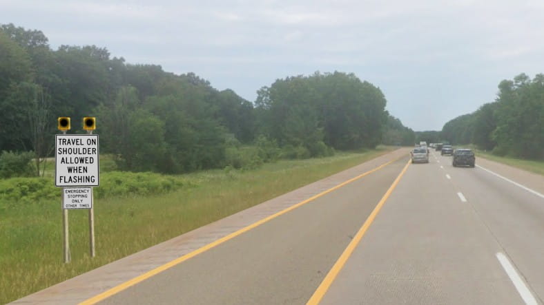 A flex route sign with the beacon turned off, so the lane are not available for use.