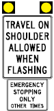 A flex route designed sign with yellow lights and information that reads, "Travel on shoulder allowed when flashing. Emergency stopping only other times."