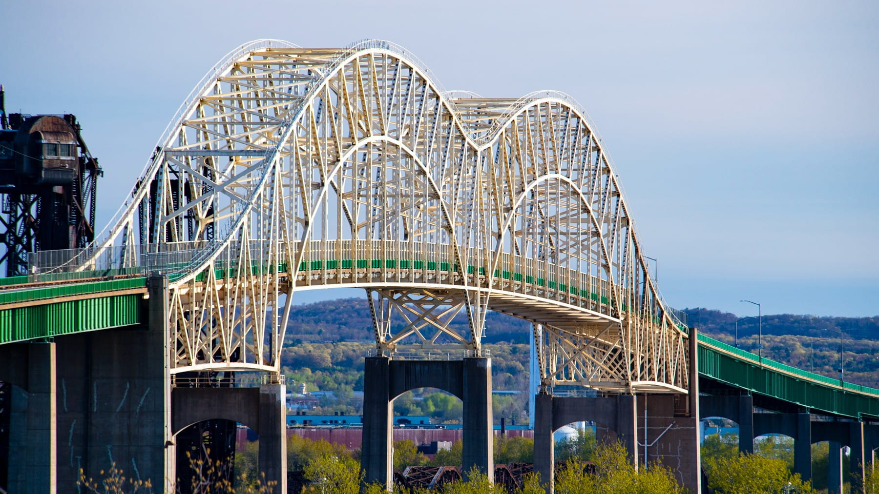 The International Bridge in red, white, and blue lights at night.