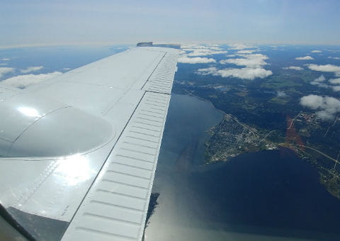 Photo of an airplane wing.