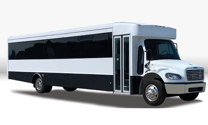A white medium duty bus.