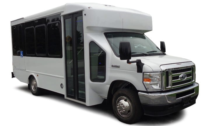 A white small light-duty bus.