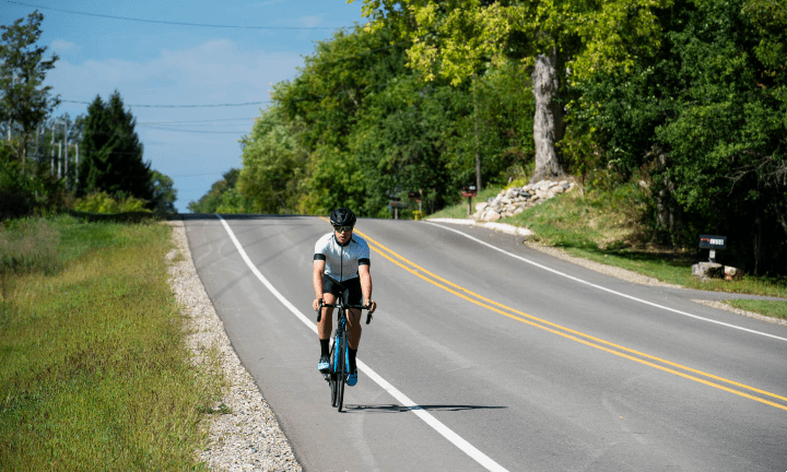 Biking on Jolly Road in East Lansing as a part of a Transportation Alternatives Program grant. 