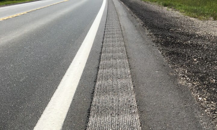 Centerline mumble strips on a rural road.