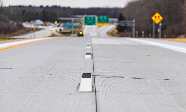 Six-Inch-Wide pavement markings on I-496 in Lansing.