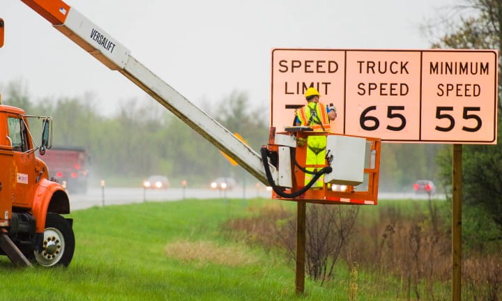 MDOT Statewide Sign crew changing the speed limit sign on US-127 to 75 mph.