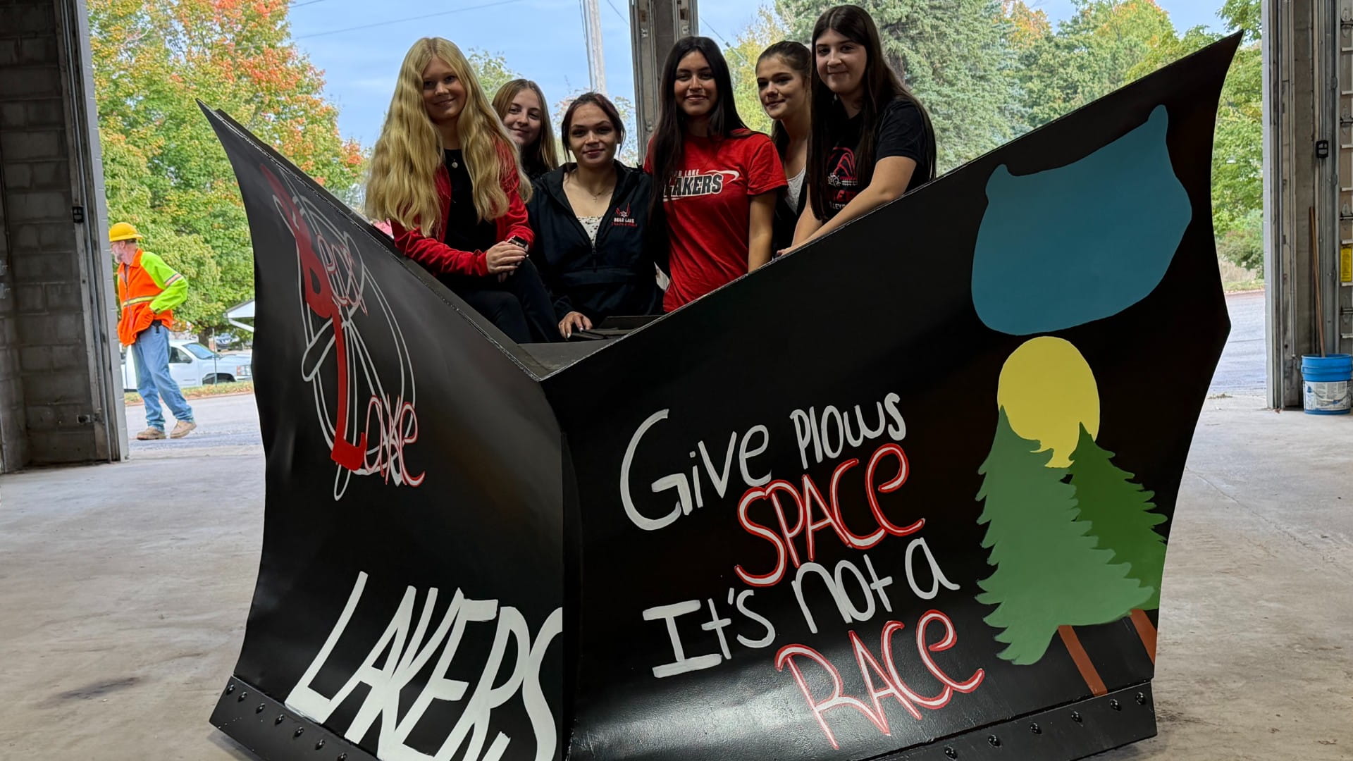 Bear Lake High School art students proudly unveiled their creative design for MDOT’s 2025-2026 Paint the Plow program.