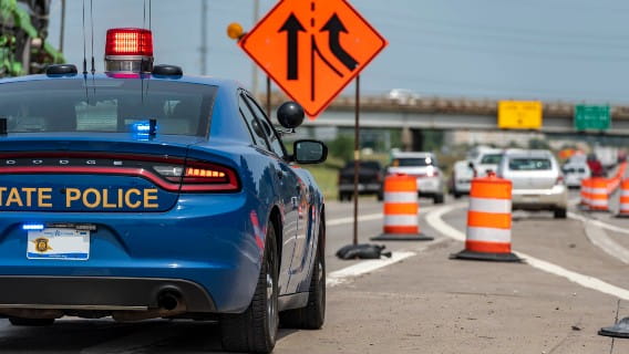 Michigan State Police patrolling an MDOT work zone.