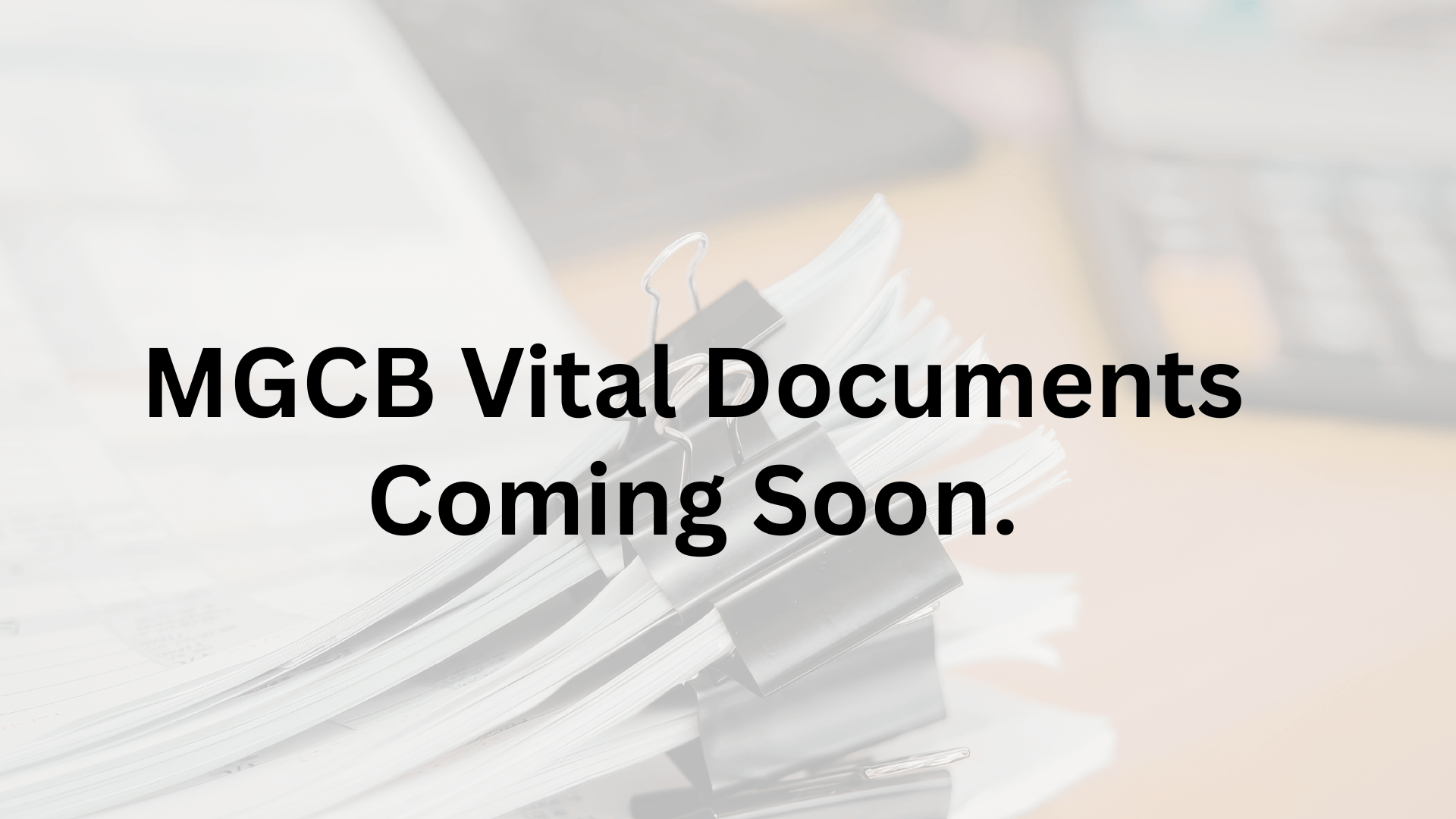 Image of papers with clips and text overlay saying that vital docs are coming soon