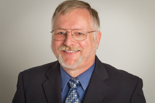 Headshot of Drew Smith.