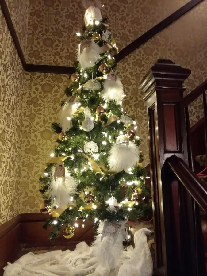 Holiday Tree decorated in Gold with white feather angels
