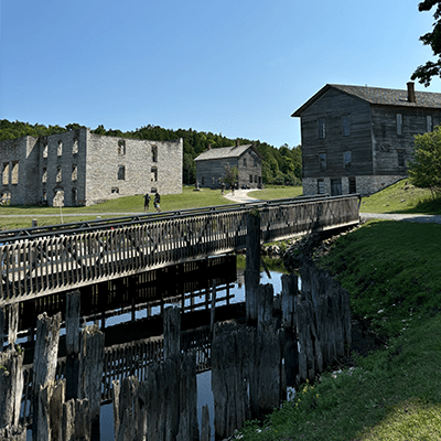 Multiple buildings and a dock at Fayette Historic Townsite.