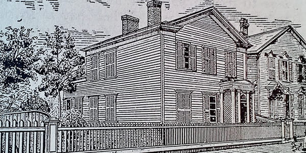 Black and white line engraving of a two-story clapboard home in Greek Revival style, circa 1860.
