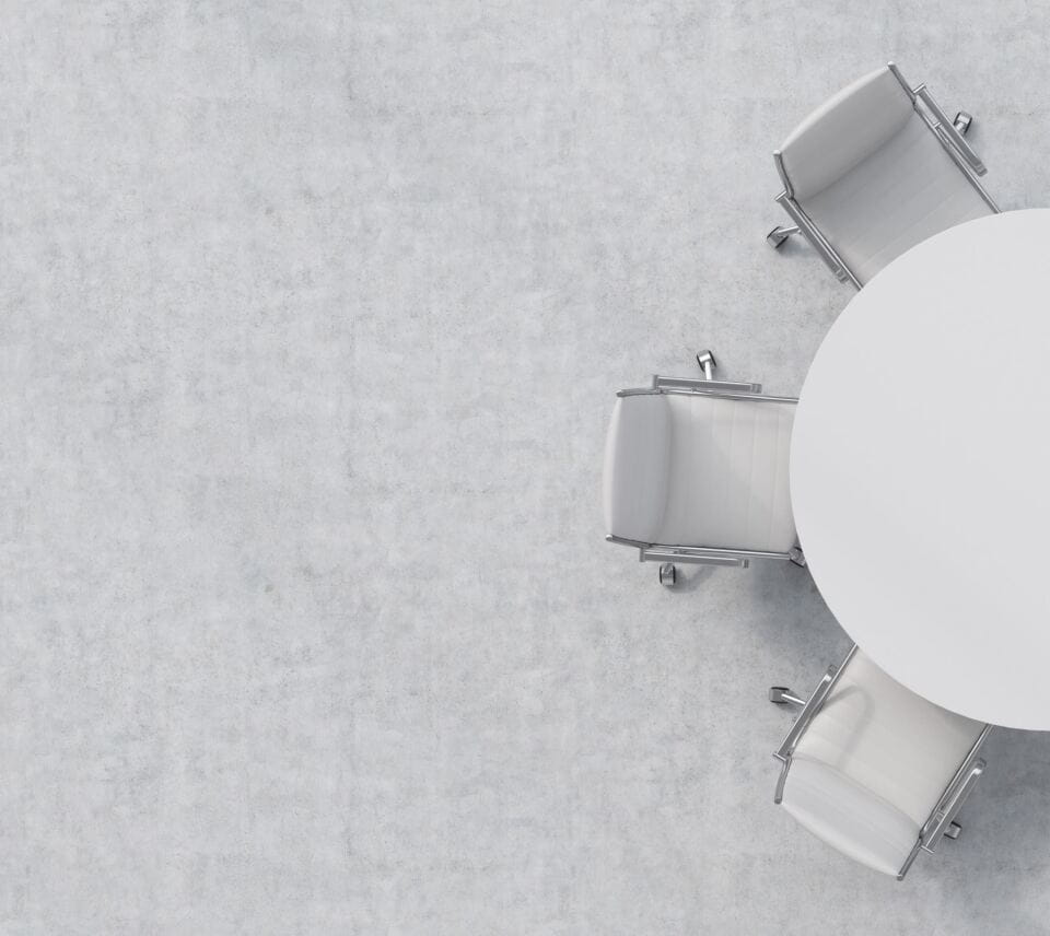 Chairs around a circular table.